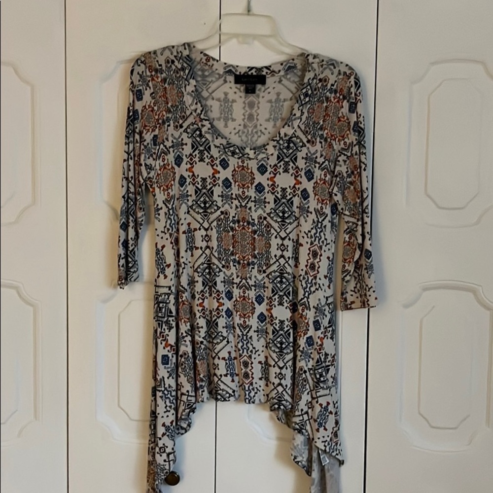 New Karen Kane shark bite tunic.
